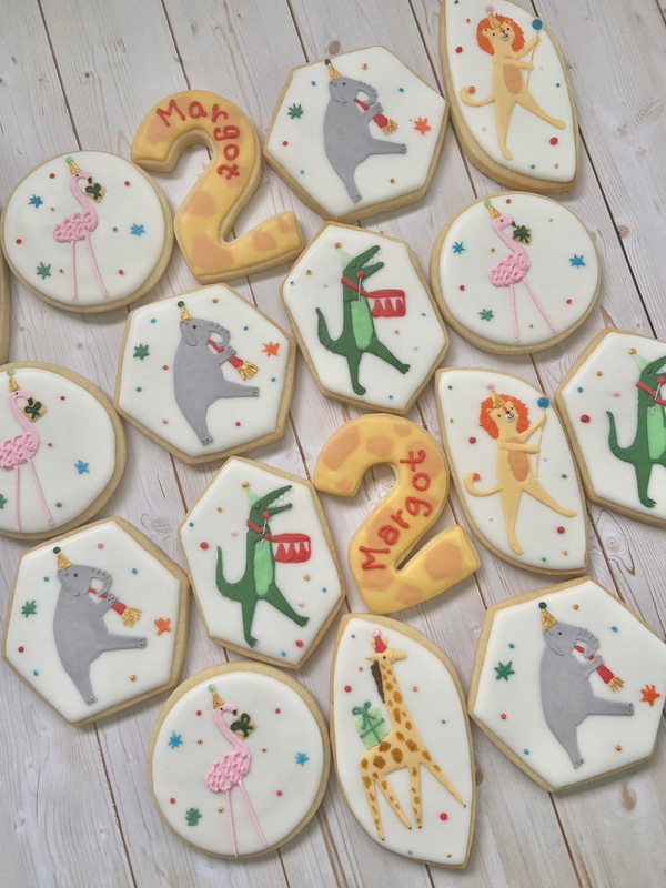 Decorated cookies with party animal designs.