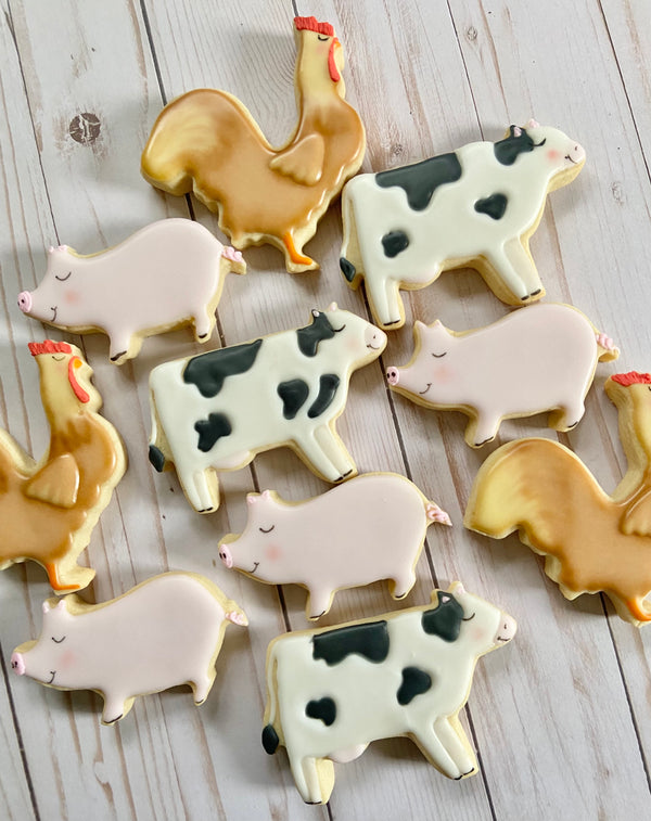 Farm cookie set - brown chickens, black and white cows, and pink pigs.